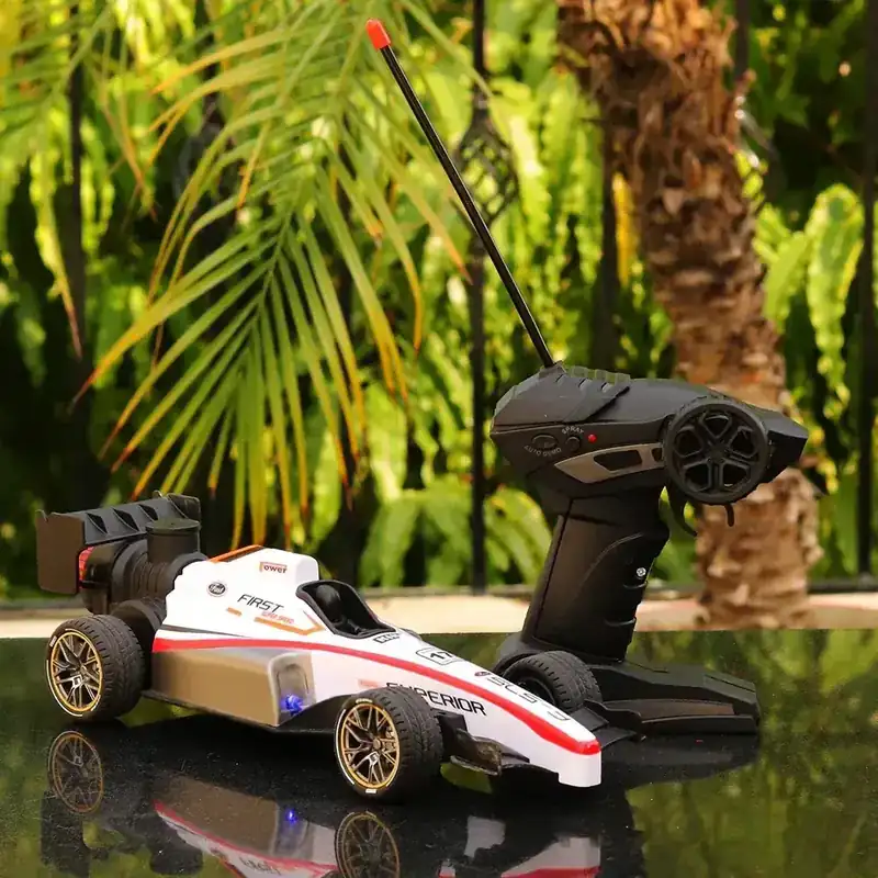 Speed Formula Remote Controlled Racing Car Toy with Lights and Spray ...